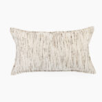 Close up of a beige striped decorative pillow against a white background