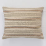 Beige striped decorative throw pillow on a white background with alternating cream and brown stripes across the front