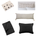 Collection of decorative cushions beige polka dot white polka dot tassel edged striped pillow and two black textured pillows on white background