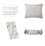 Group of decorative pillows white striped pillow stack a beige quilted cushion a floral throw blanket and a gray knotted pillow on a white background