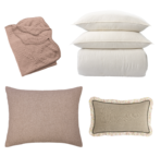 Pile of neutral pillows with a pink quilted blanket on the left against a white background