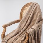 Amity home alma throw in mushroom   textured alpaca weave