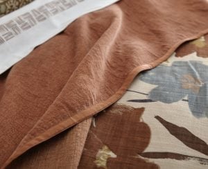 Amity home adair  kai collection in rust  blue   textured linen with floral print