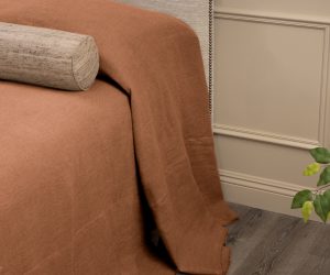 Amity home ranier linen bedspread in ochre   raw edge detail