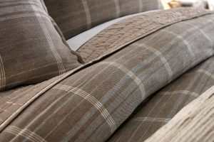 Amity home aurora  barber collection in brown plaid   quilted detail