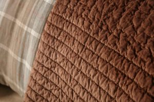 Amity home aurora  barber collection in brown   diamond quilted texture