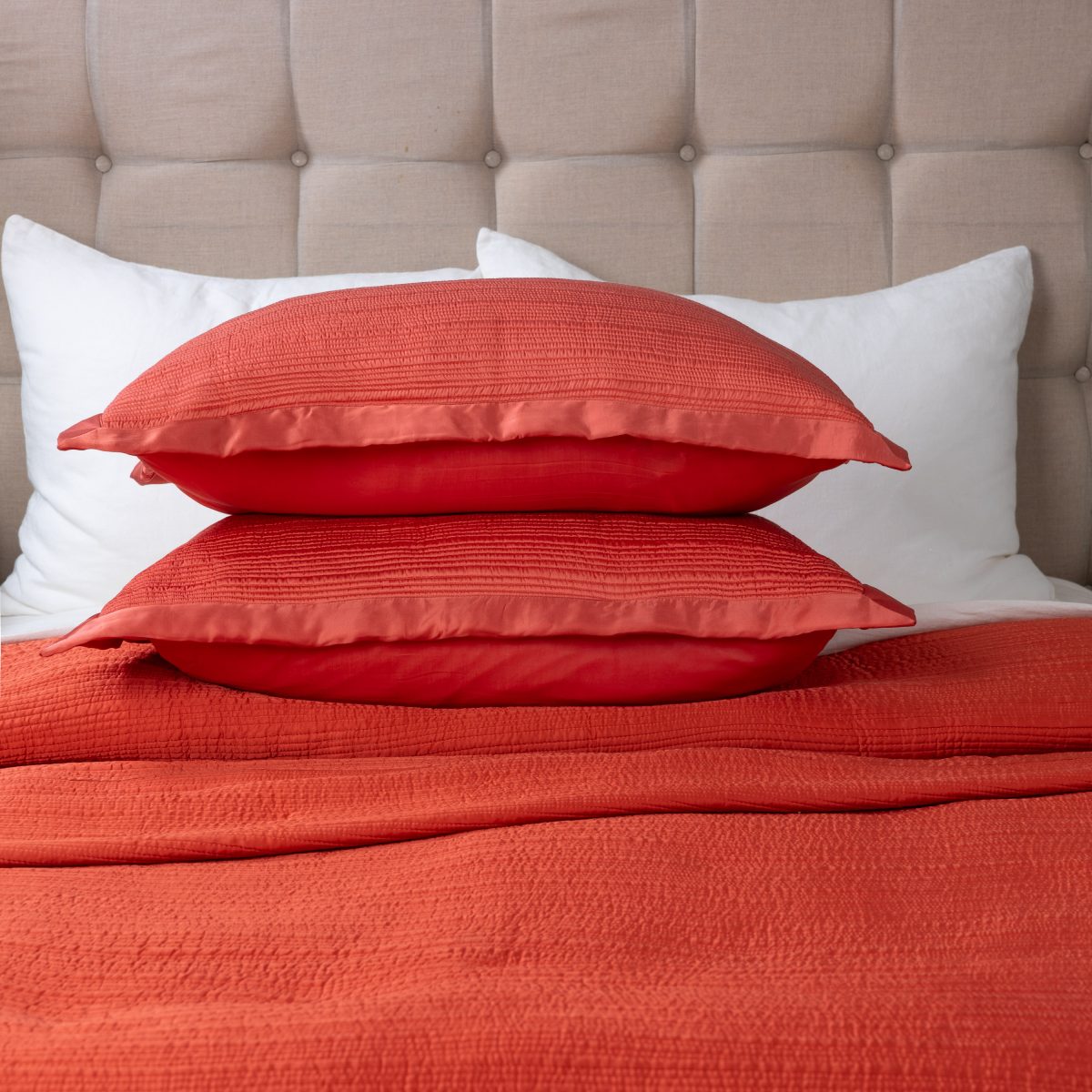 Amity home christelle quilt in coral   smocked texture