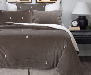 Amity home hawke quilt in charcoal   velvet with tassel tufting