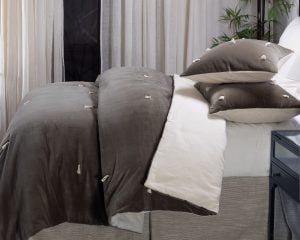 Amity home hawke quilt in charcoal   tufted knot details