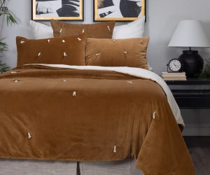 Amity home hawke quilt in ochre   velvet with knotted accents