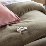 Amity home hawke quilt in laurel   tufted knot detail