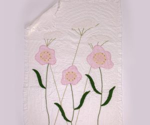 Amity home wildflowers baby quilt in whitepink   floral appliqué  ruffled edge