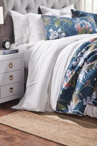 Amity home fitzgerald quilt in adriatic   quilted floral design