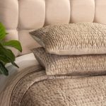 Amity home baldwin quilt in caramel   ruched velvet texture