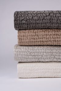 Amity home baldwin quilt in caramel   textured puckered stitching