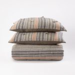 Amity home redford quilt in grey  peach   woven geometric pattern