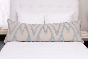 Amity home amaya body pillow in mineral blue  natural   tufted zigzag pattern