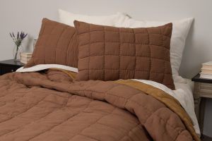 Amity home spencer quilt in ochre   grid stitched pattern