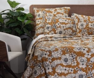 Amity home tinsley quilt in ochre   hand stitched floral pattern