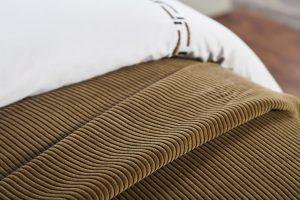 Amity home saunders coverlet in cypress   ribbed corduroy texture