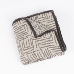 Amity home aubrey  malvern quilt in creamgrey   geometric woven pattern with velvet trim