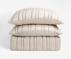 Amity home emery quilt in opal   vertical channel stitching