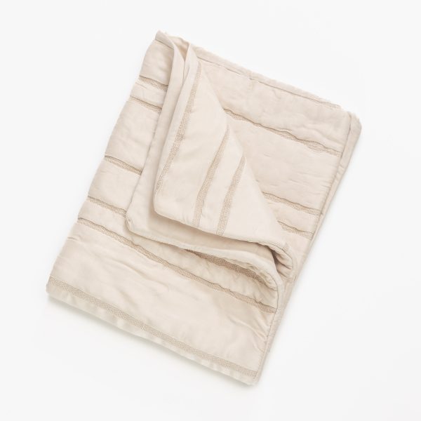 Amity home emery quilt in opal   channel stitched texture