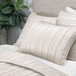 Amity home emery quilt in opal   vertical channel stitching
