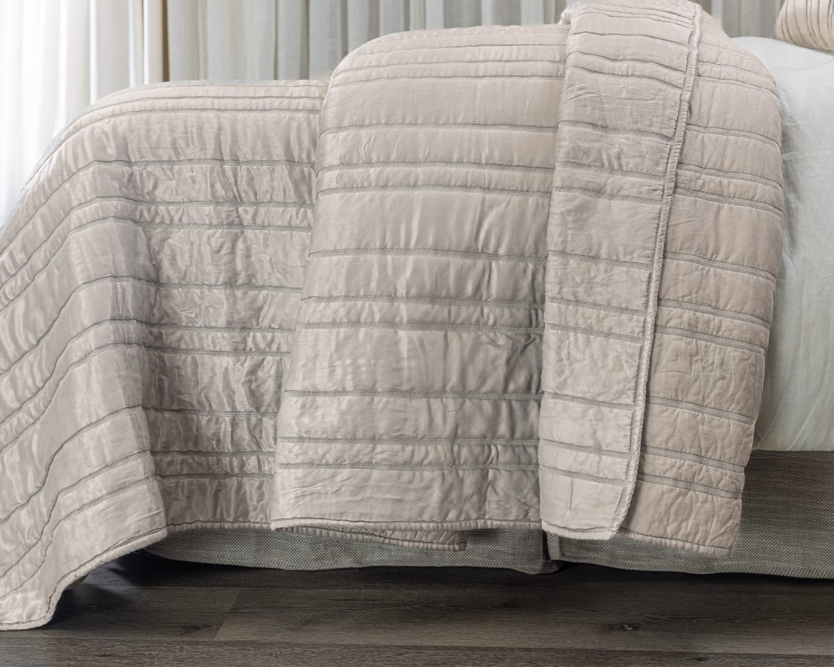 Amity home emery quilt in opal   textured horizontal channel stitching