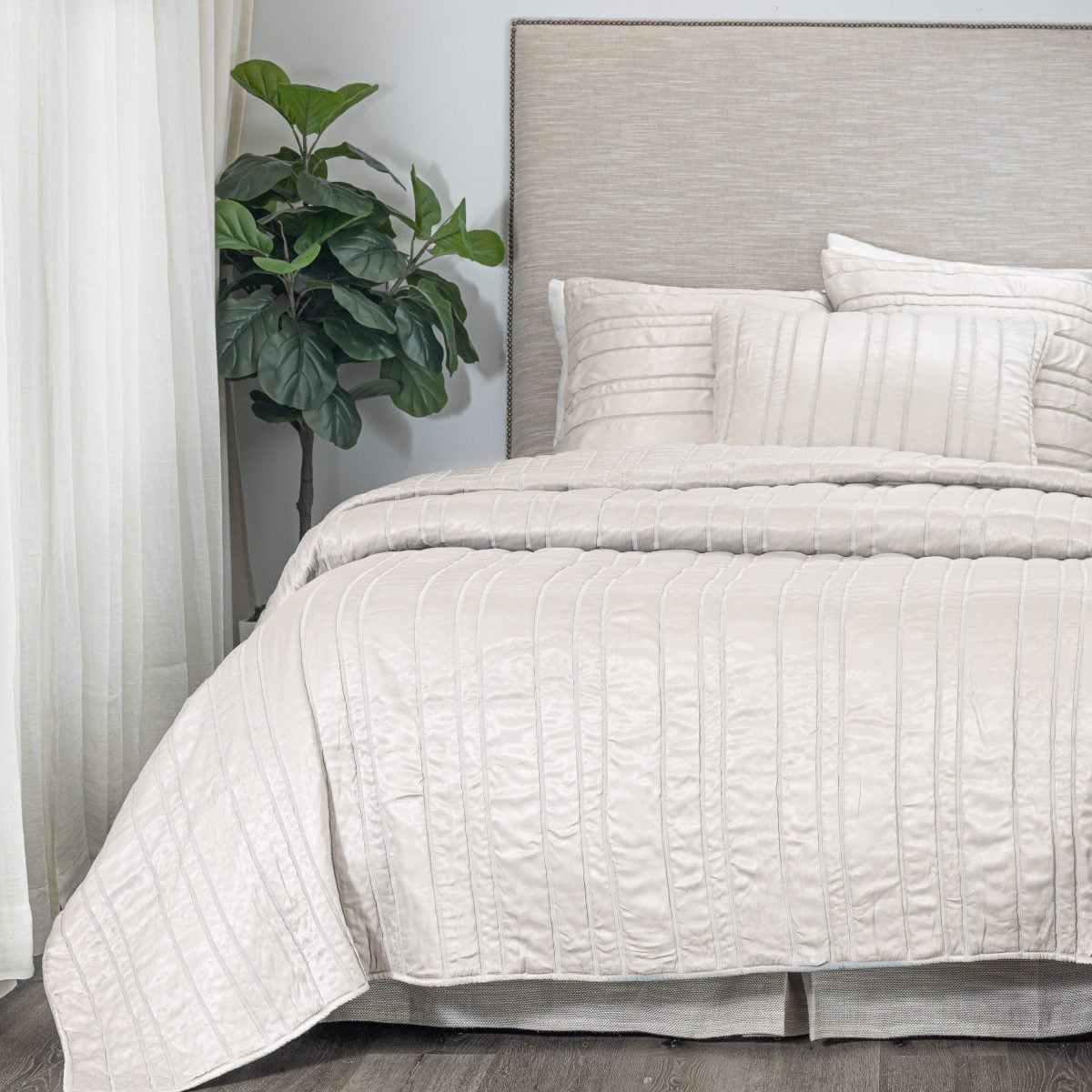 Amity home emery quilt in opal   vertical channel stitched