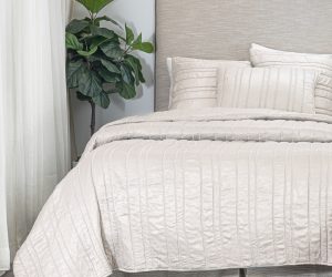 Amity home emery quilt in opal   vertical channel stitched