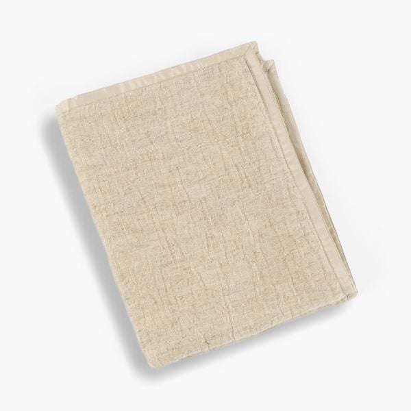 Amity home basey coverlet in natural   textured weave with smooth binding