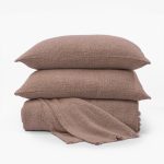 Amity home andrea coverlet in rose gold   soft bouclé knit texture