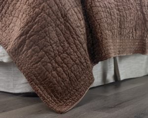 Amity home aurora quilt in copper   puckered texture
