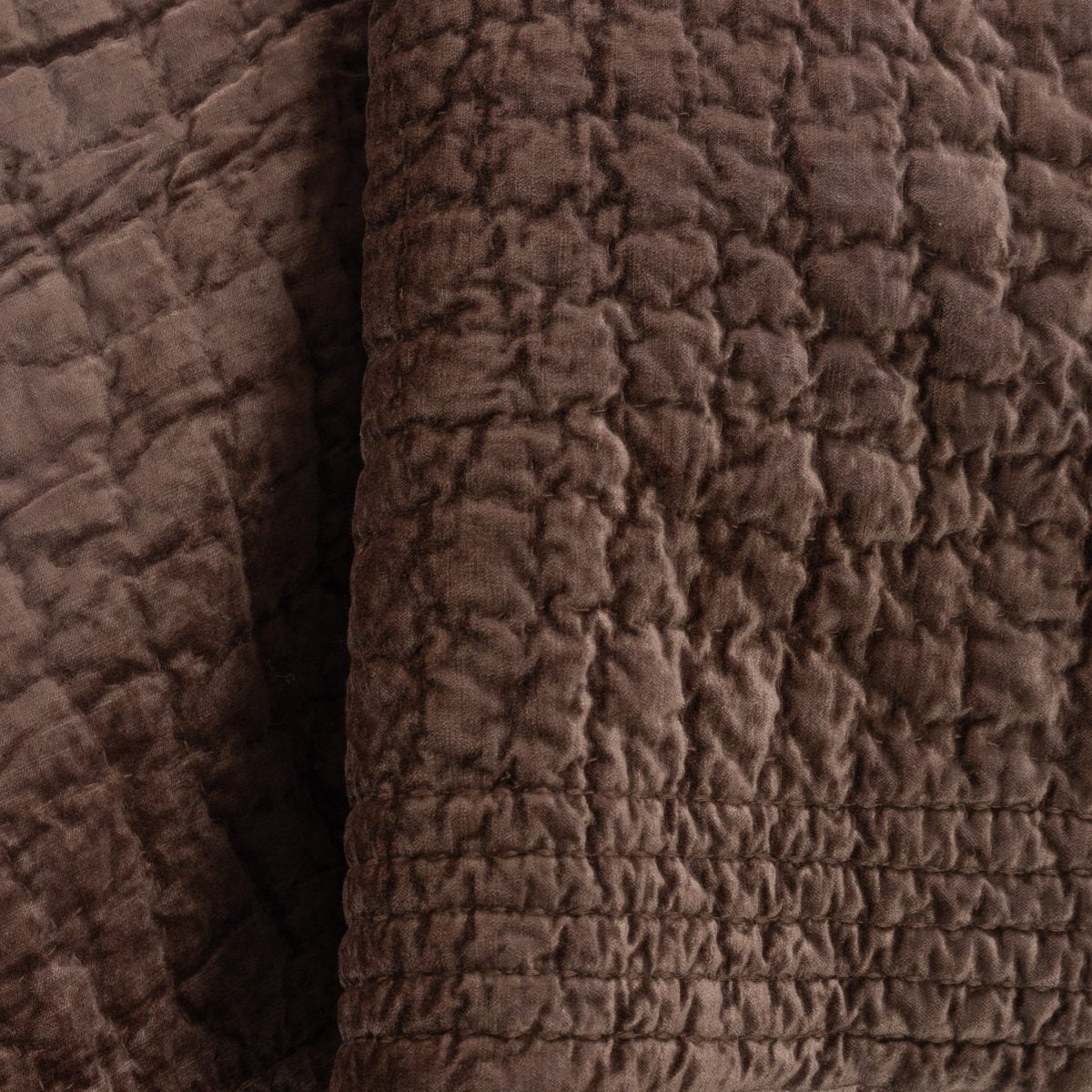 Amity home aurora quilt in copper   puckered velvet quilted texture