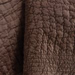 Amity home aurora quilt in copper   puckered velvet quilted texture