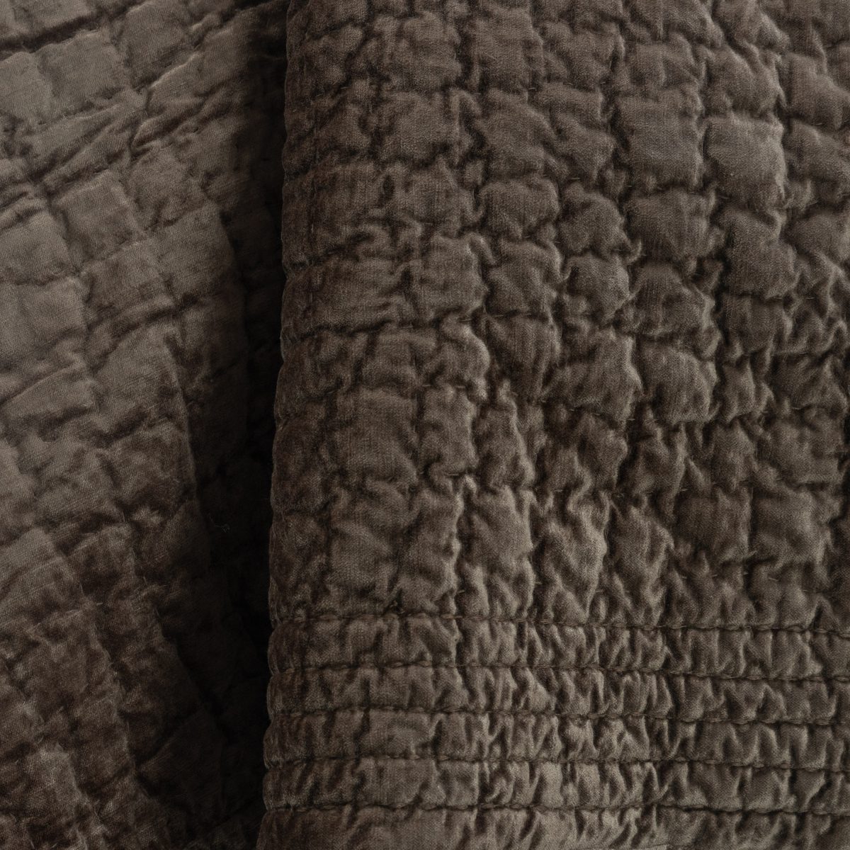 Amity home aurora quilt in tobacco   crinkled velvet texture