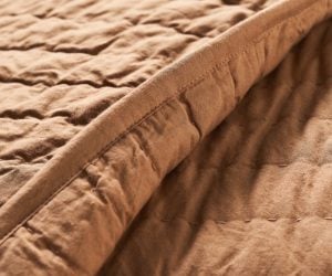 Amity home basecamp  pure quilt in caramel brown   tacked quilting