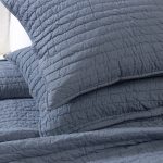 Amity home base camp quilt in shadow   crinkled horizontal quilting