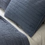 Amity home base camp quilt in shadow   horizontal channel stitching