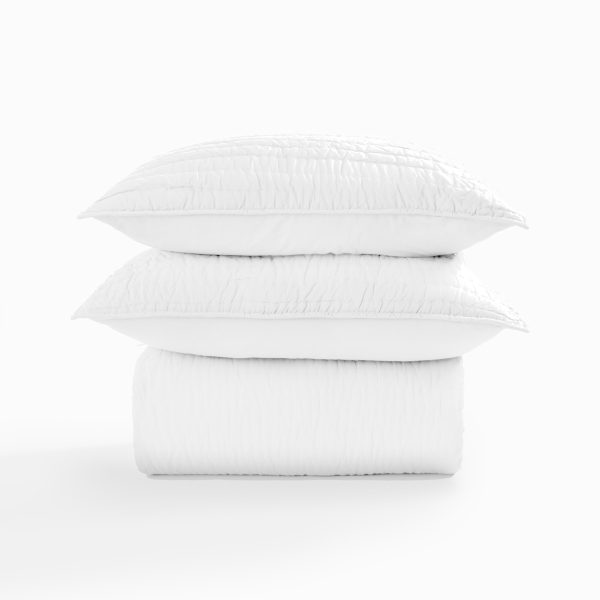 Amity Home Base Camp Quilt - white luxury quilt with a distinctive ruched texture, stacked with two matching shams.
