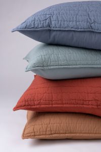 Amity home base camp quilt in mineral   horizontal channel quilting