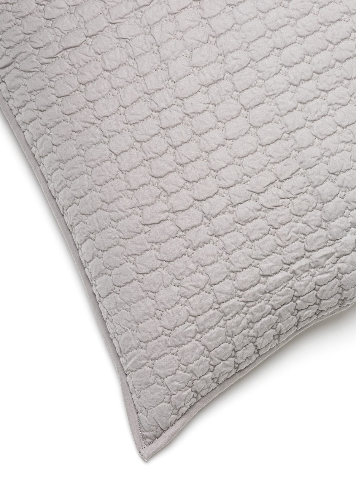 Amity home urban quilt   grey with a textured geometric quilted pattern and piped edge