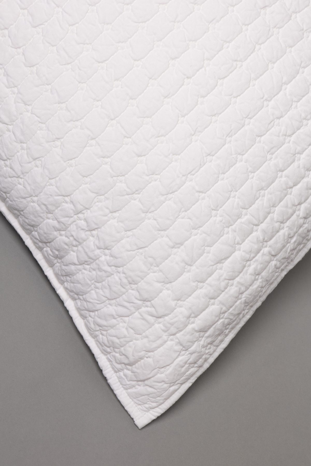 Amity home urban quilt   white luxury bedding with a diagonal quilted pattern of soft puffed rectangles