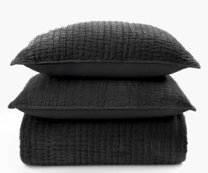 Amity home ethan quilt   stacked charcoal grey quilt and two pillows with a soft plush textured quilting
