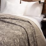 Amity home chiarra quilt in grey floral   intricate quilted pattern