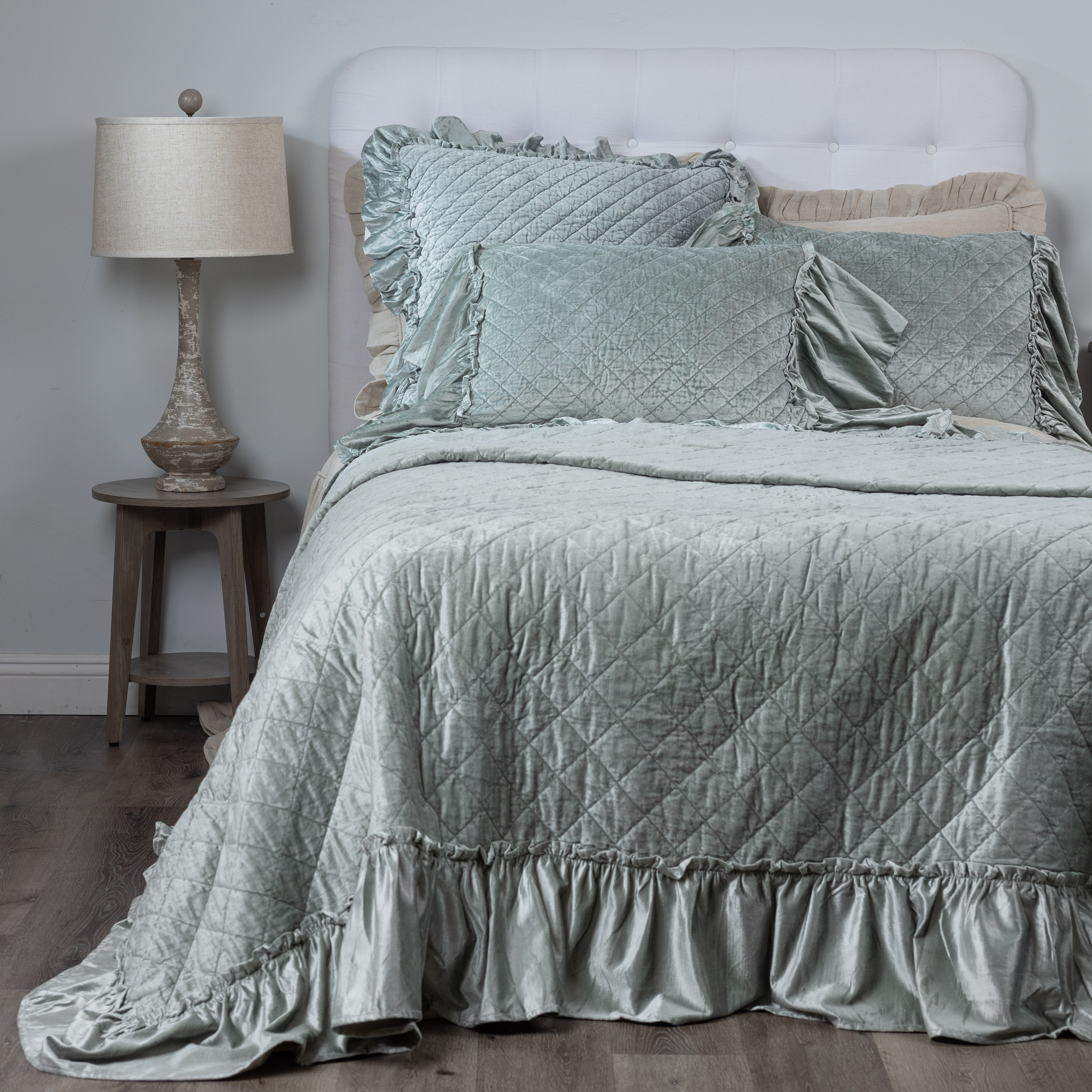 Cc798sgbed12 | Amity Home Amity home estrella quilt sea glass crushed velvet quilt with diamond quilting and ruffled edges on a styled bed