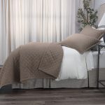 Amity home dale linen quilt in walnut brown with diamond quilting and soft texture styled on a bed with matching shams
