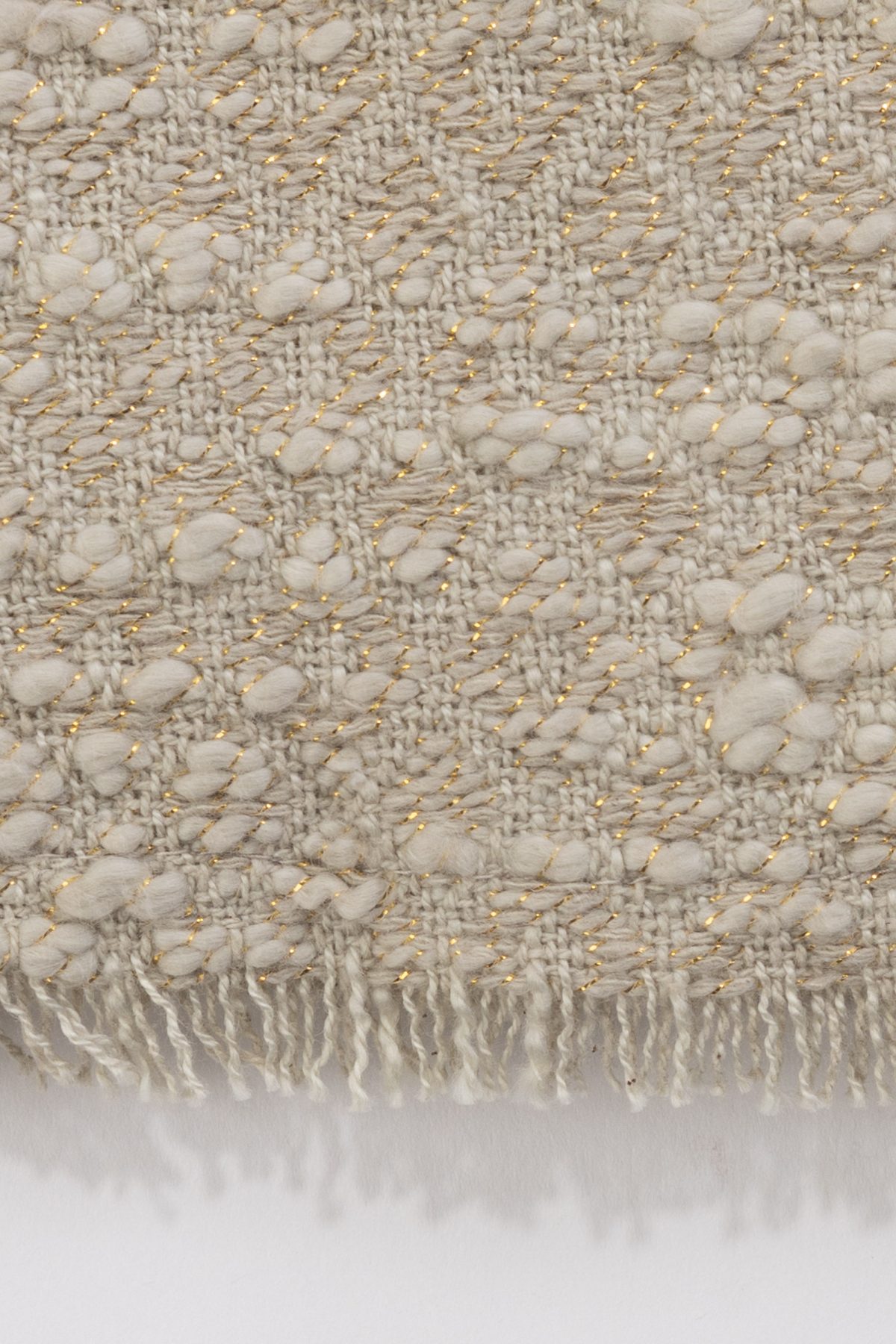 Amity home orlana lurex throw in oyster   bouclé texture with gold threads