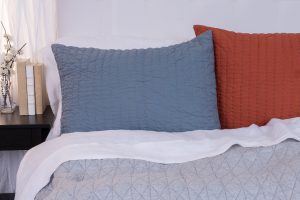 Amity home twain quilt in mineralochre   textured linear stitch